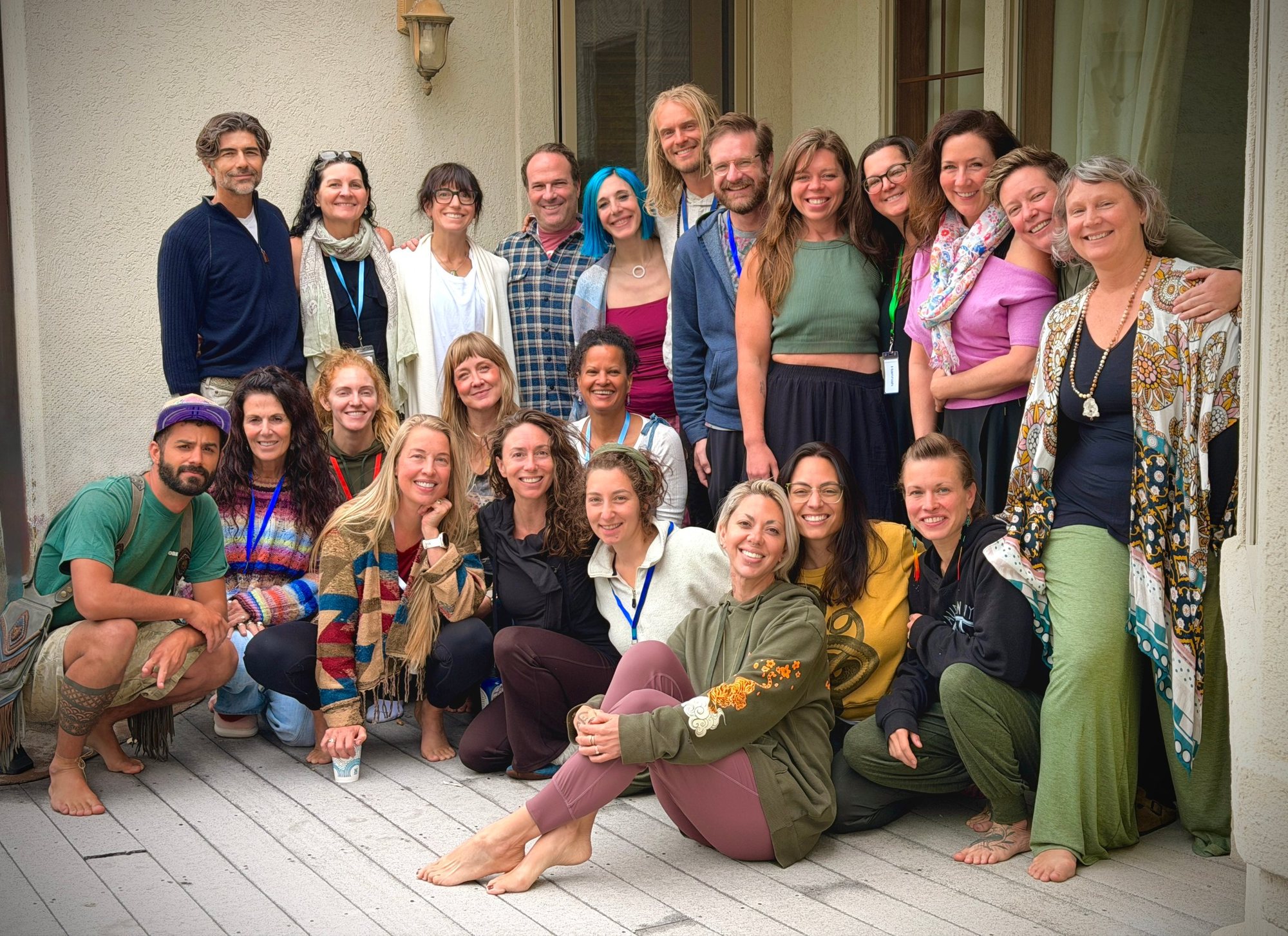The Camp Retreats Colorado team together on the deck of the retreat house
